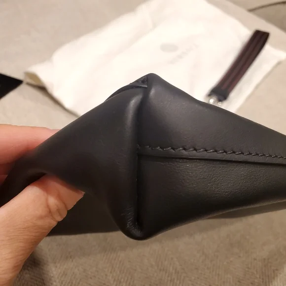 Brand new Versace leather clutch wrislet